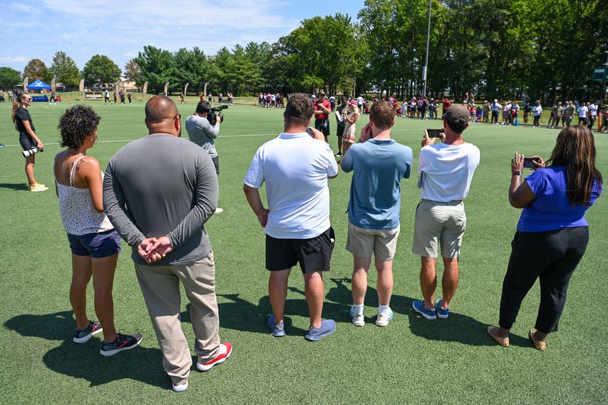 Suitland, MD - The Washington Commanders hosted a walk-through practice at Joint Base Andrews. After the practice, the players interacted with the on-site military personnel, their families, and friends. (Joe Glorioso | All-Pro Reels)