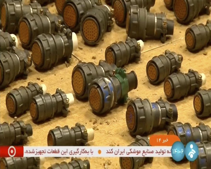 This frame grab from video footage released Thursday, Aug. 31, 2023, by Iranian state television's IRINN network shows what officials described as faulty foreign parts that could be used in a missile or a drone. Iran accused Israel on Thursday of trying to sabotage its ballistic missile program through faulty foreign parts that could explode, damaging or destroying the weapons before they could be used. (IRINN via AP)