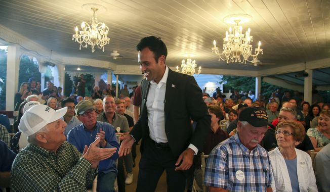Republican presidential hopeful Vivek Ramaswamy greets the crows during a campaign stop on Friday, Sept. 1, 2023, in Hampton, N.H. (AP Photo/Reba Saldanha)
