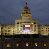 In this Jan. 14, 2019 file photo, a large Texas flag hangs from the Texas State Capitol in Austin, Texas. The Supreme Court refused Tuesday to block a lower court order siding with Texas over its law aimed at requiring age verification to view pornographic websites. (AP Photo/Eric Gay, File)