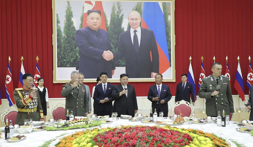 In this photo provided by the North Korean government, North Korean leader Kim Jong-un, center, and Russian Defense Minister Sergei Shoigu, center left, attend a banquet at the ruling Workers' Party's headquarters in Pyongyang, North Korea on July 27, 2023. Independent journalists were not given access to cover the event depicted in this image distributed by the North Korean government. The content of this image is as provided and cannot be independently verified. (Korean Central News Agency/Korea News Service via AP, File)