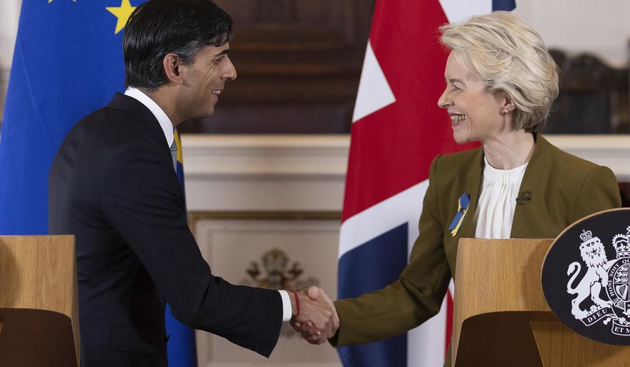 FILE - Britain's Prime Minister Rishi Sunak and EU Commission President Ursula von der Leyen, right, shake hands after a press conference at Windsor Guildhall, Windsor, England, Monday Feb. 27, 2023. Britain is rejoining the European Union’s science-sharing program Horizon Europe. The news announced Thursday, Sept. 7, 2023 comes more than two years after Britain's membership became a casualty of Brexit.(Dan Kitwood/Pool via AP, File)