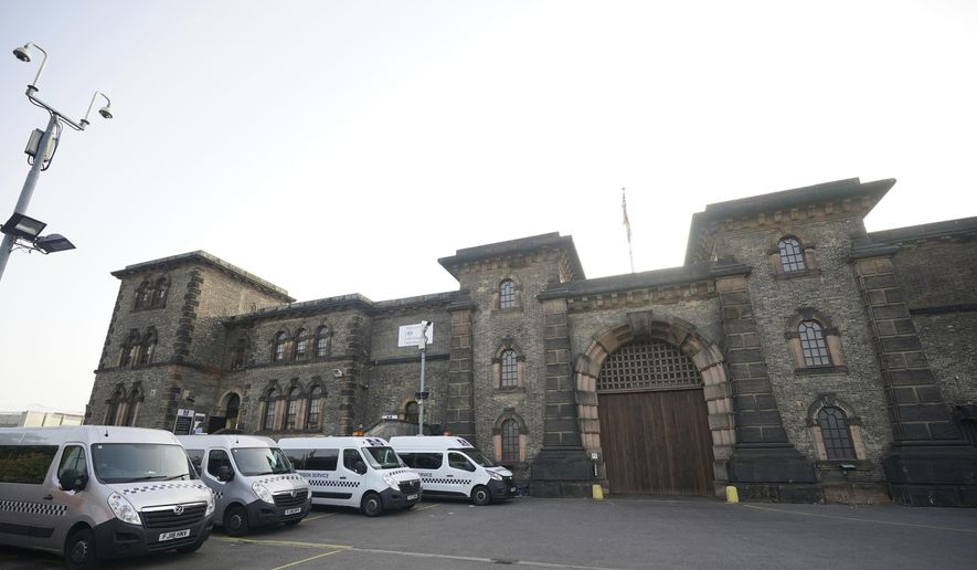 A general view of HMP Wandsworth in London where a British soldier awaiting trial on terror-related charges has escaped from a prison in southwest London Wednesday, Sept. 6, 2023 and police have launched an urgent manhunt. Counterterror police say Daniel Abed Khalife went missing from Wandsworth Prison early Wednesday. (Yui Mok/PA via AP)