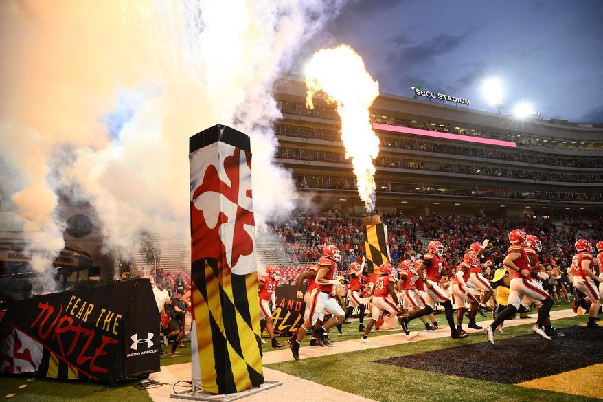Maryland takes the field before an NCAA college football game against Charlotte, Saturday, Sept. 9, 2023, in College Park, Md. (AP Photo/Nick Wass)