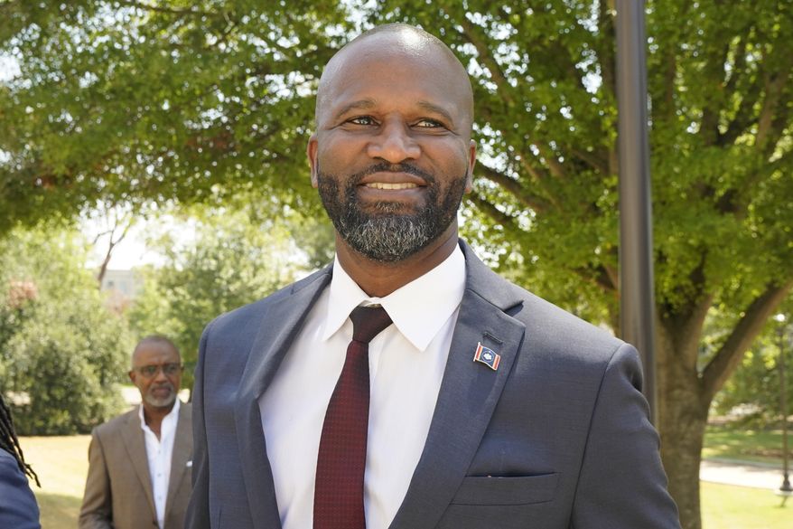 Attorney Ty Pinkins arrives at the Mississippi Capitol in Jackson, Miss., to speak with reporters about his becoming the new nominee of the state Democratic Party for secretary of state to replace a candidate who left the race because of health problems, Thursday, Sept. 7, 2023. Pinkins faces Republican incumbent Michael Watson in the Nov. 7 general election. (AP Photo/Rogelio V. Solis)