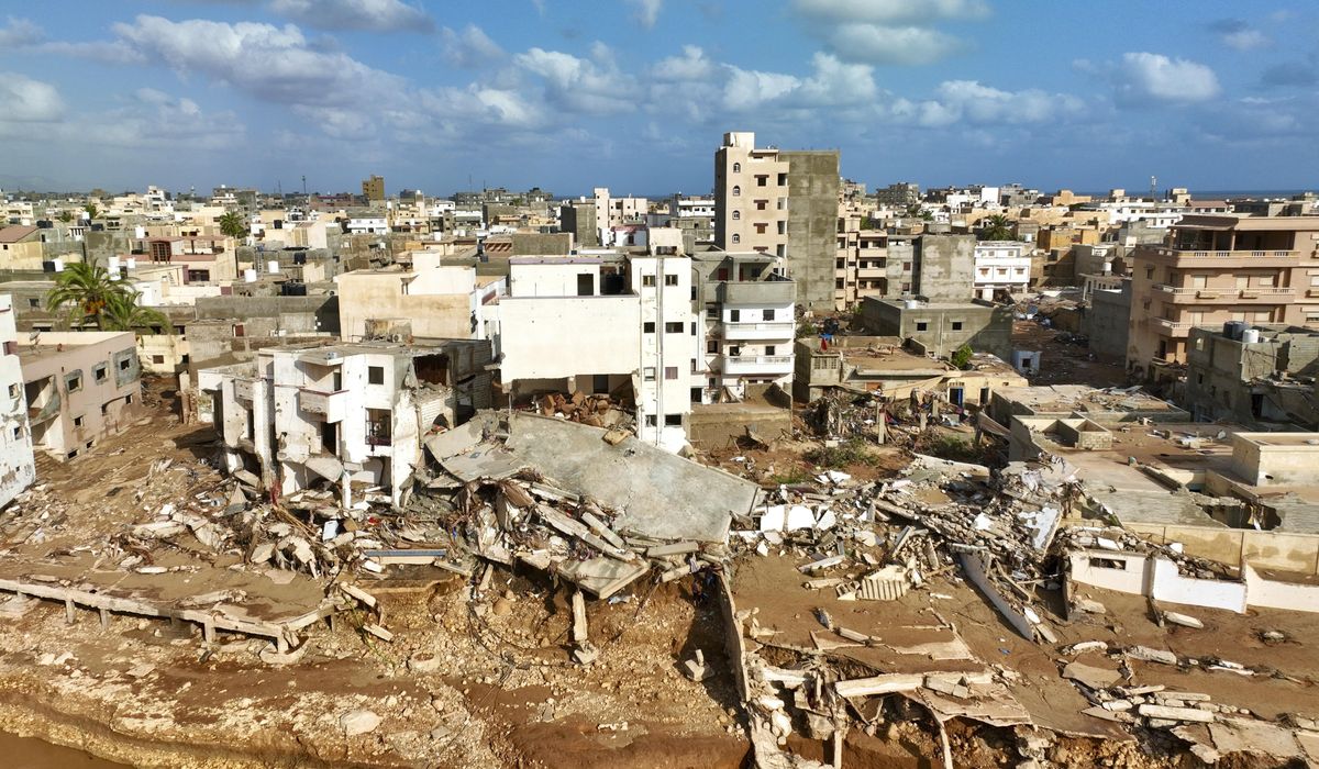 NextImg:Rescuers recover over 2,000 bodies after floods devastate eastern Libya and displace 30,000 people