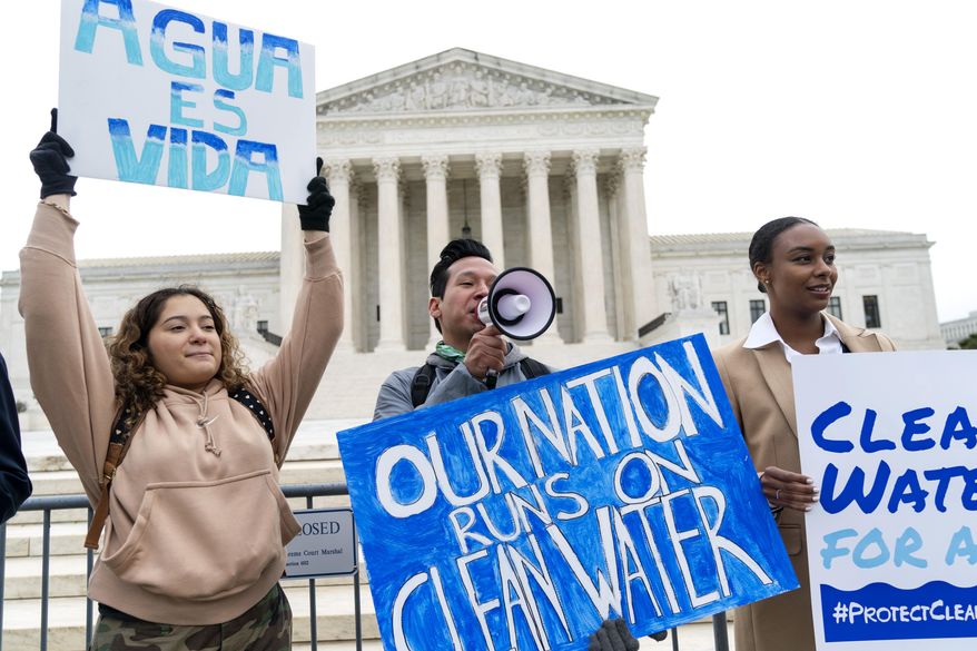 Bethsaida Sigaran, left, of Baltimore, her brother Jaime Sigaran, with American Rivers, and Thea Louis, with Clean Water Action, join supporters of the Clean Water Act as they demonstrate outside the Supreme Court, Monday, Oct. 3, 2022, in Washington, as the court begins arguments in Sackett v. Environmental Protection Agency (EPA). States and Native American tribes will have greater authority to block energy projects such as natural gas pipelines that could pollute rivers and streams under a final rule issued Thursday, Sept. 14, 2023, by the Biden administration. (AP Photo/Jacquelyn Martin) **FILE**