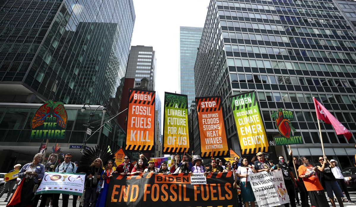 NextImg:Thousands march to kick off climate summit, demanding an end to warming-causing fossil fuels