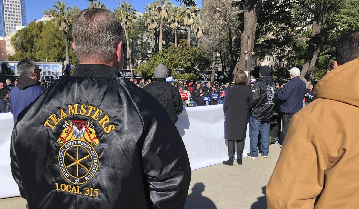 NextImg:California truck drivers ask Gov. Newsom to sign job-saving bill as self-driving big rigs are tested