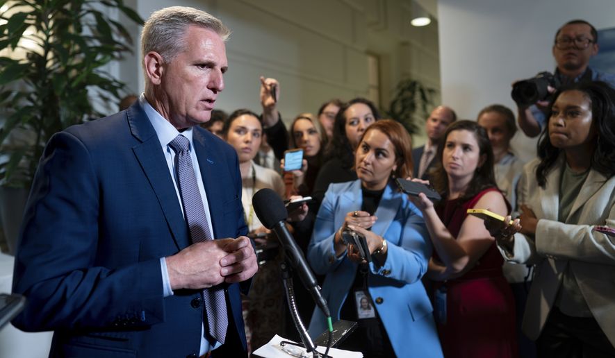 Speaker of the House Kevin McCarthy, R-Calif., briefs reporters following a closed-door Republican Conference meeting on how to agree on a path to funding the government, at the Capitol in Washington, Tuesday, Sept. 19, 2023. House Republican leaders have still been unable to pass next year's appropriations bills on the floor due to GOP infighting. (AP Photo/J. Scott Applewhite)
