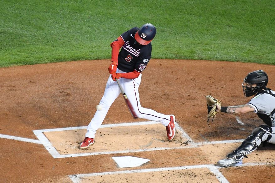 Washington Nationals shortstop C.J. Abrams (5) hitting a triple during the first inning of an MLB game against the Chicago White Sox at Nationals Park in Washington D.C., September 19, 2023. (Photo by Billy Sabatini/All-Pro Reels)