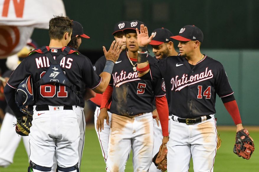 Washington Nationals players celebrate after their 4-3 victory over the Chicago White Sox at Nationals Park in Washington D.C., September 19, 2023. (Photo by Billy Sabatini/All-Pro Reels)