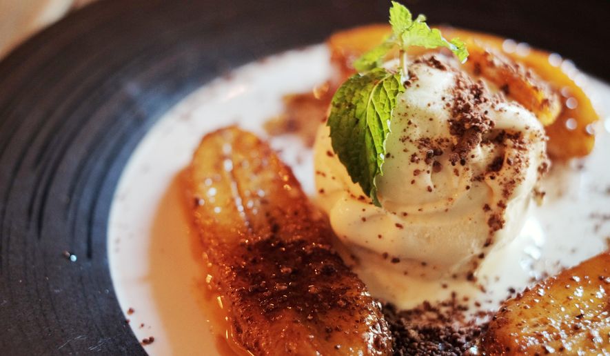 Banana flambe with vanilla ice cream. File photo credit: k.sritrairak via Shutterstock.