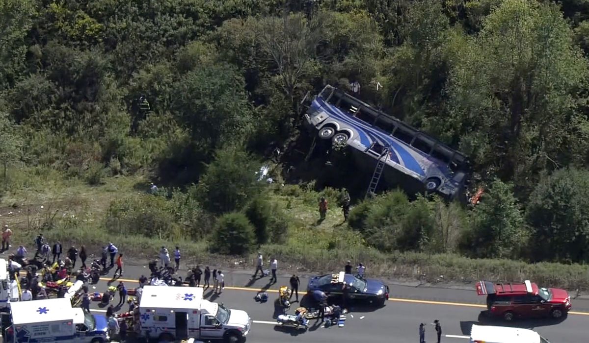 NextImg:Bus carrying high school students to band camp crashes, killing 2 and seriously injuring others