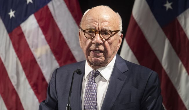 FILE - Rupert Murdoch introduces Secretary of State Mike Pompeo during the Herman Kahn Award Gala, Wednesday, Oct. 30, 2019, in New York. (AP Photo/Mary Altaffer, File)