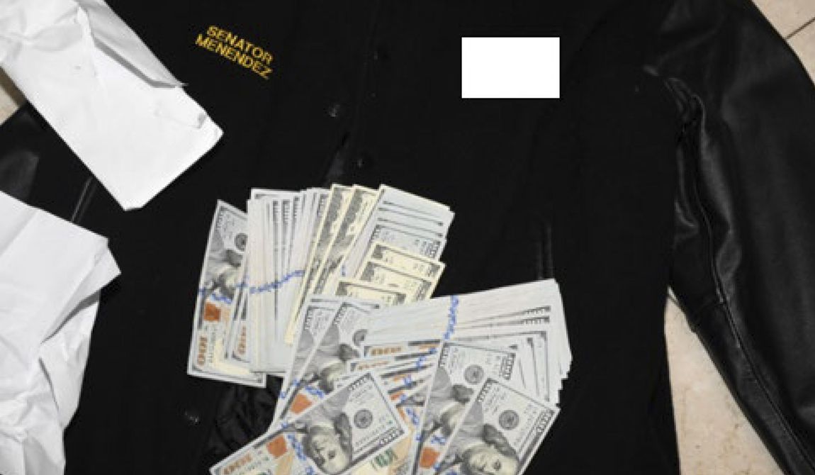 This photo, which was included in an indictment of U.S. Sen. Bob Menendez (D-N.J.), shows a jacket bearing Menendez&#x27;s name, along with cash from envelops found inside the Jacket during a search by federal agents of the senator&#x27;s home in Harrison, N.J., in 2022. Federal prosecutors announced charges of bribery against Menendez and his wife, Nadine Arslanian Menendez, on Friday, Sept. 22, 2023. Additional information on the jacket was redacted by the source. (U.S. Attorney&#x27;s Office via AP)