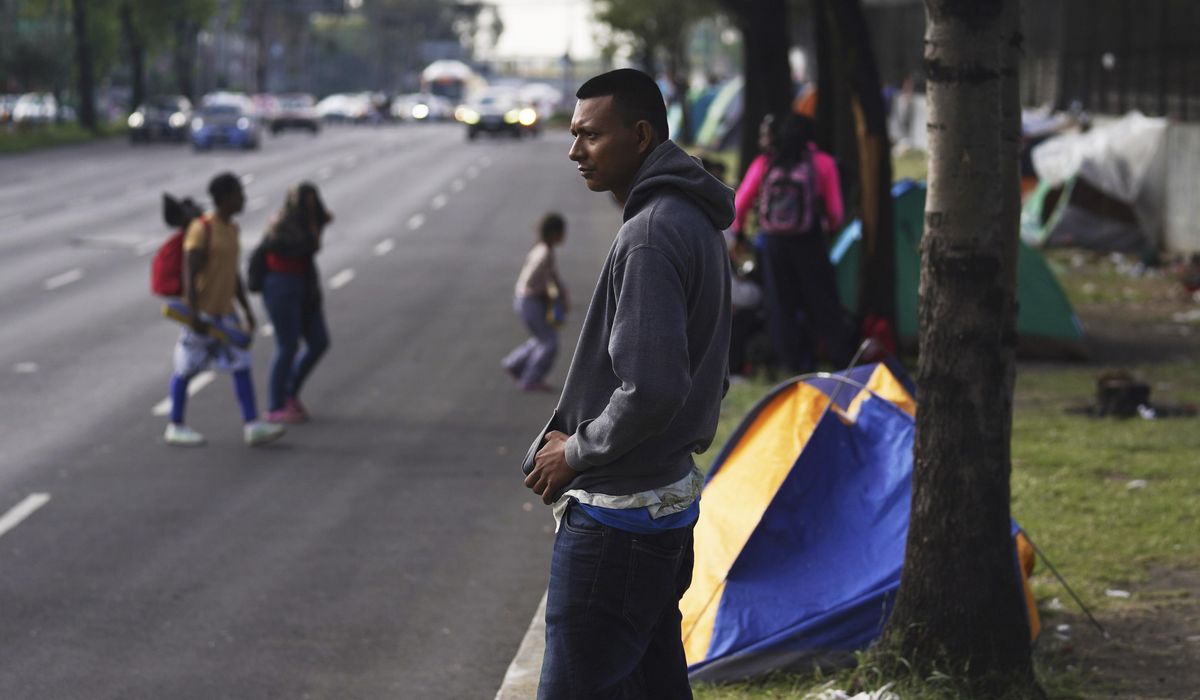 NextImg:With temporary status for Venezuelans, the Biden administration turns to a familiar tool
