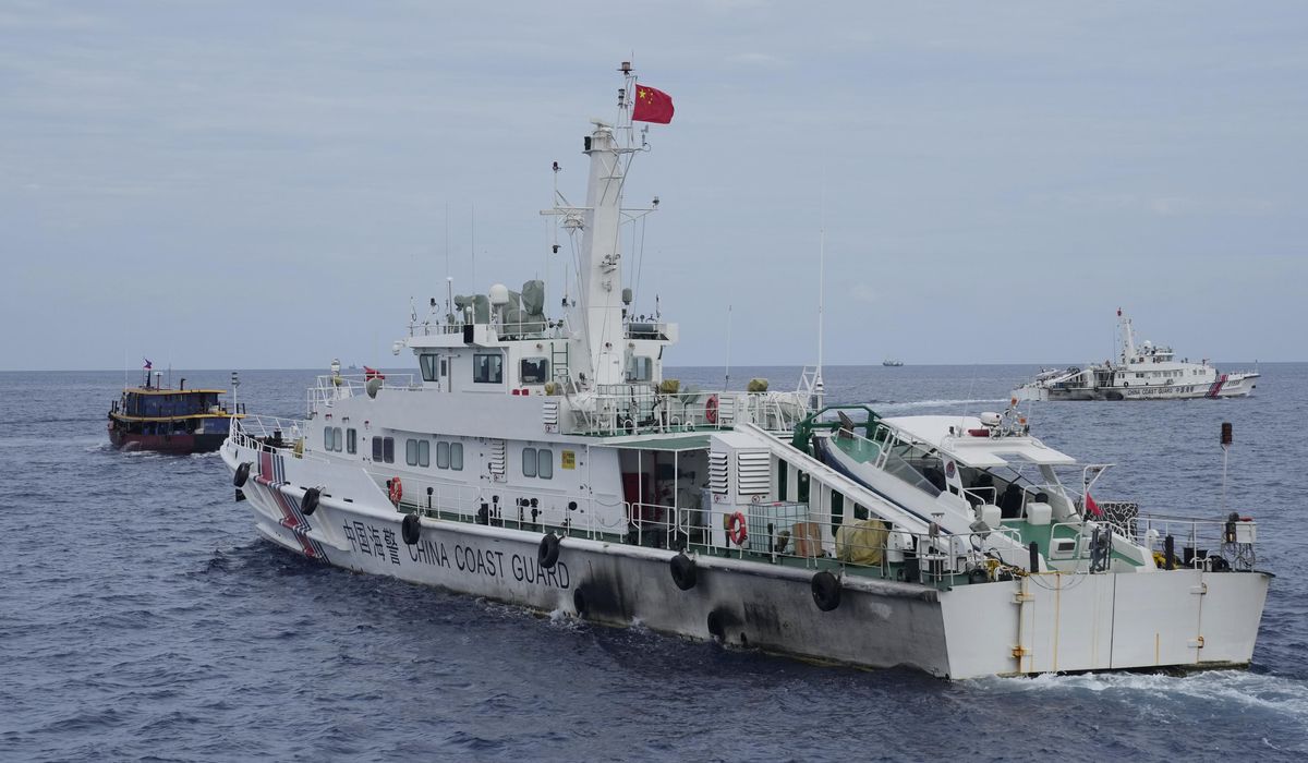 NextImg:Philippines says it will remove any barrier China installs in the disputed South China Sea