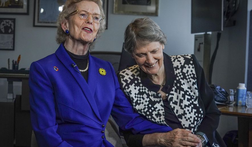 Former Irish President Mary Robinson, left, and former New Zealand Prime Minister Helen Clark, both members of Elders, "an independent group of global leaders working for peace, justice, human rights and a sustainable planet" founded by Nelson Mandela in 2007, hold an interview to discuss the group's progress, Wednesday Sept. 20, 2023, in New York. (AP Photo/Bebeto Matthews)