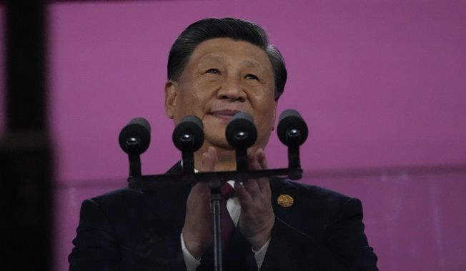 Chinese President Xi Jinping attends the opening ceremony of the 19th Asian Games in Hangzhou, China, Saturday, Sept. 23, 2023. (AP Photo/Lee Jin-man)