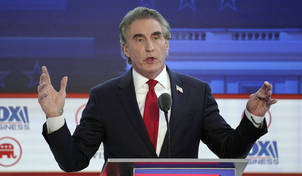 NextImg:Doug Burgum points finger at Biden EV tax credits for worsening UAW strike