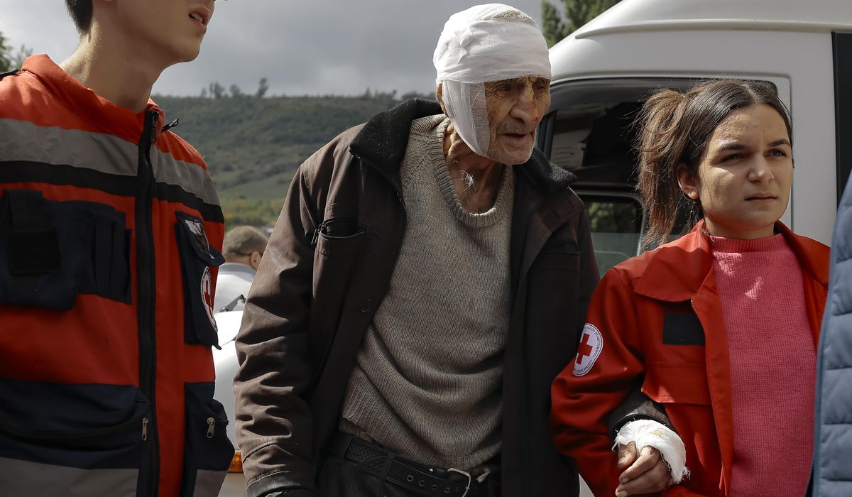 NextImg:Half of Nagorno-Karabakh’s population flees as the separatist government says it will dissolve