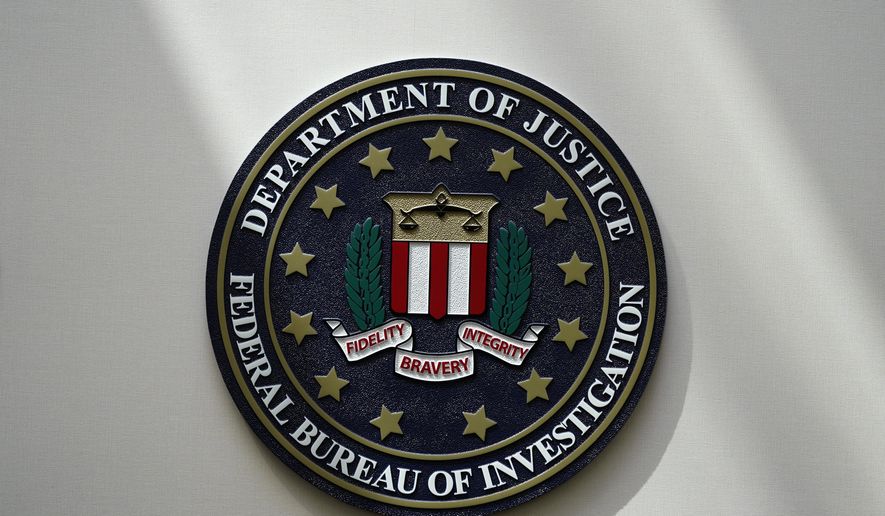 The FBI seal is pictured in Omaha, Neb., Aug. 10, 2022. (AP Photo/Charlie Neibergall, File)