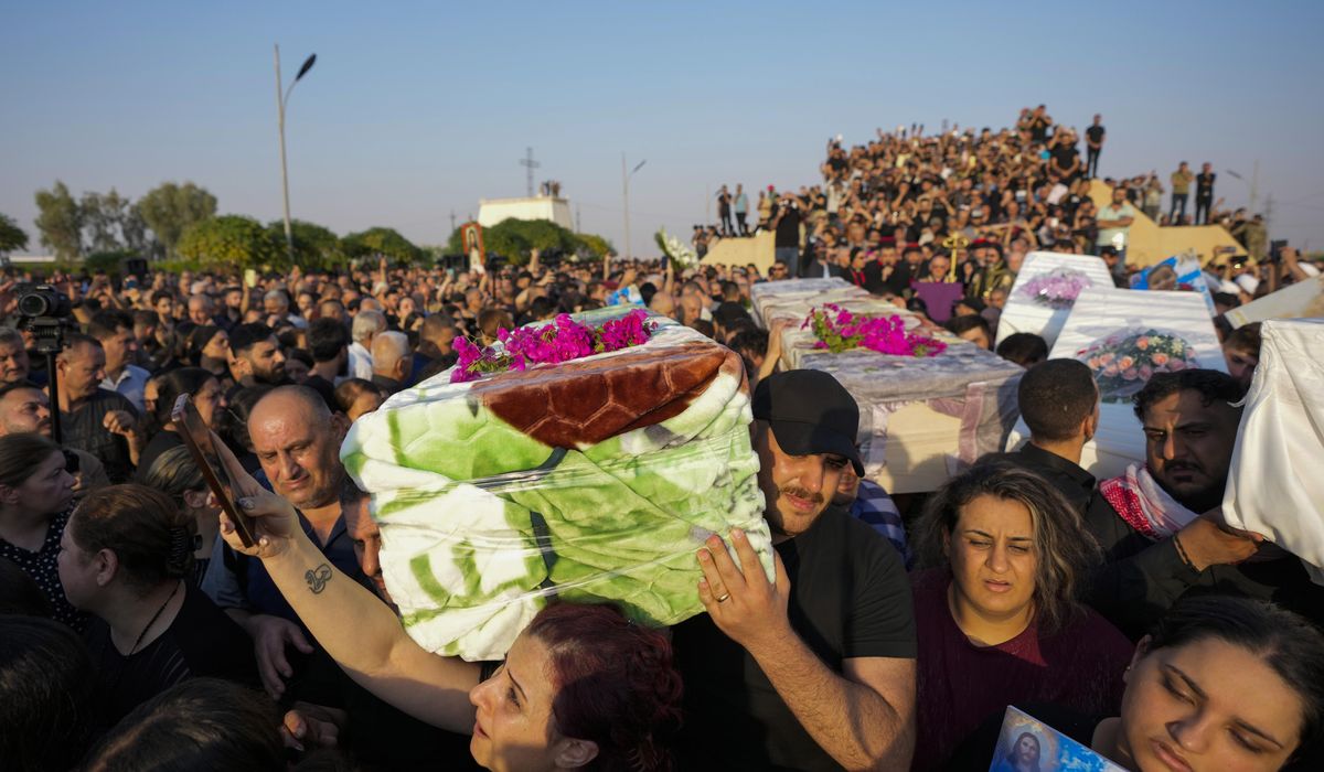 NextImg:Iraq’s prime minister visits wedding fire victims as 2 more people die from their injuries