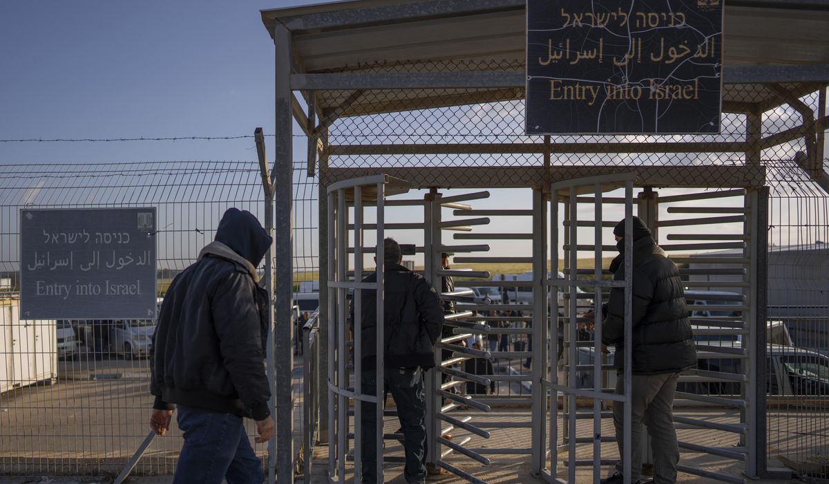 NextImg:Israel reopens the main Gaza crossing for Palestinian laborers and tensions ease