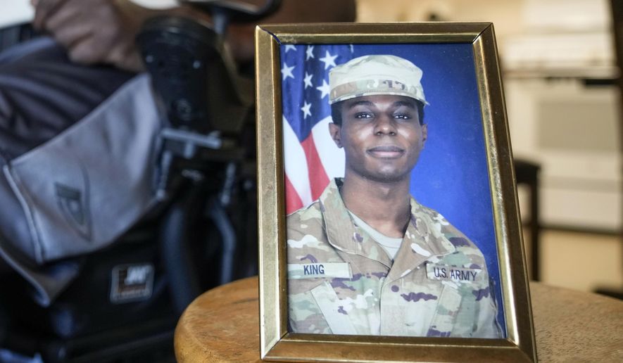 A portrait of American soldier Travis King is displayed as his grandfather, Carl Gates, talks about his grandson on July 19, 2023, in Kenosha, Wis. North Korea says on Wednesday, Sept. 27, it has decided to expel a U.S. soldier who crossed into the country through the heavily armed inter-Korean border in July. (AP Photo/Morry Gash, File)