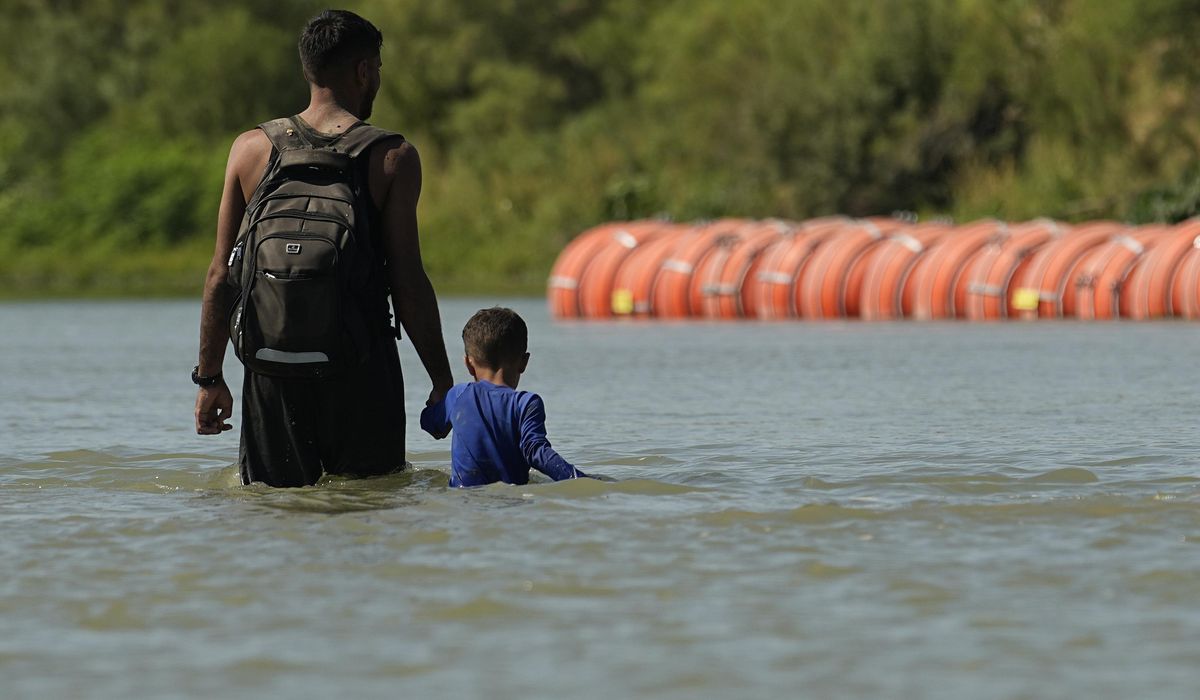 NextImg:‘A state of war exists in Texas’: Abbott’s floating border wall case tests migrant invasion theory