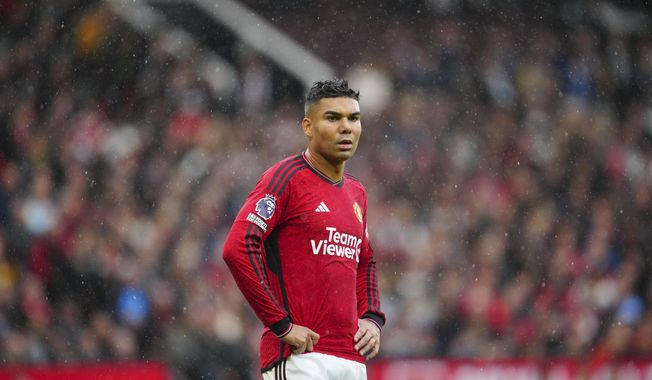 Manchester United&#x27;s Casemiro looks on during the English Premier League soccer match between Manchester United and Crystal Palace at the Old Trafford stadium stadium in Manchester, England, Saturday, Sept. 30, 2023. (AP Photo/Jon Super)