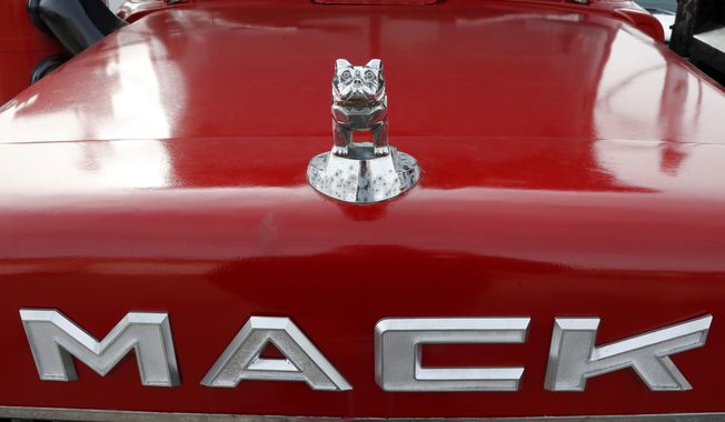 The bulldog hood ornament is seen on a used Mack truck that is available at a lot in Evans City, Pa., Jan. 9, 2020. (AP Photo/Keith Srakocic, File)