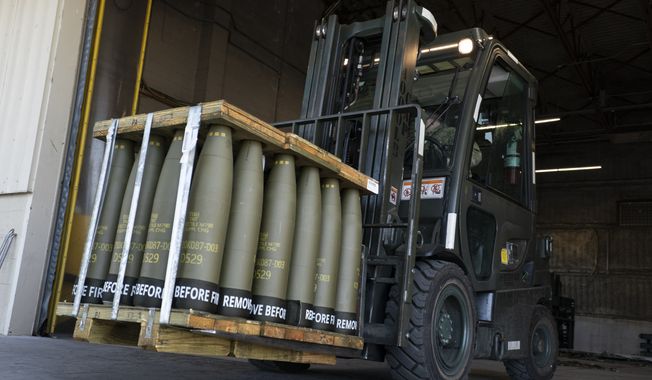 Airmen with the 436th Aerial Port Squadron use a forklift to move 155 mm shells ultimately bound for Ukraine, April 29, 2022, at Dover Air Force Base, Del. When U.S. lawmakers approved a spending bill Saturday, Sept. 30, that averted a widely expected government shutdown, the measure didn鈥檛 include the $6 billion in military assistance that Ukraine said it urgently needed. Now the Pentagon, White House and European allies are urging Congress to quickly reconsider. (AP Photo/Alex Brandon, File)