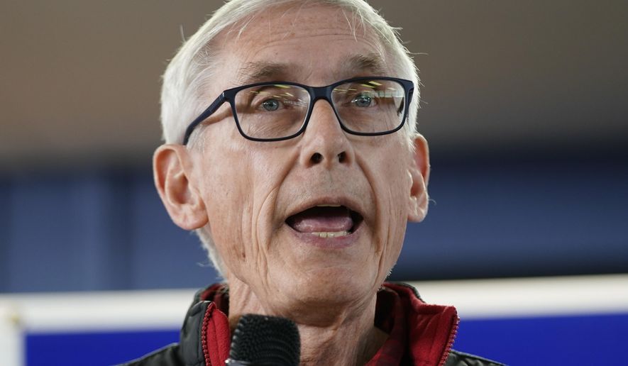 Wisconsin Democratic Gov. Tony Evers speaks at a campaign stop, Oct. 27, 2022, in Milwaukee. A man illegally brought a handgun into the Wisconsin Capitol on Wednesday, demanding to see Gov. Tony Evers, and returned at night with an assault rifle after posting bail, a spokesperson for the state said Thursday, Oct. 5, 2023, (AP Photo/Morry Gash, File)