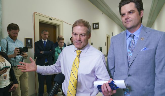 Rep. Jim Jordan, R-Ohio, left, and Rep. Matt Gaetz, R-Fla., speak to reporters after a hearing investigating former President Donald Trump, at the Capitol in Washington, Friday, June 4, 2021. Now the House Judiciary Committee chairman, the longtime Republican stalwart has emerged as a top contender to replace former House Speaker Kevin McCarthy who was voted out of the job by a contingent of hard-right conservatives on Oct. 3, 2023, led by Gaetz. (AP Photo/J. Scott Applewhite, File)