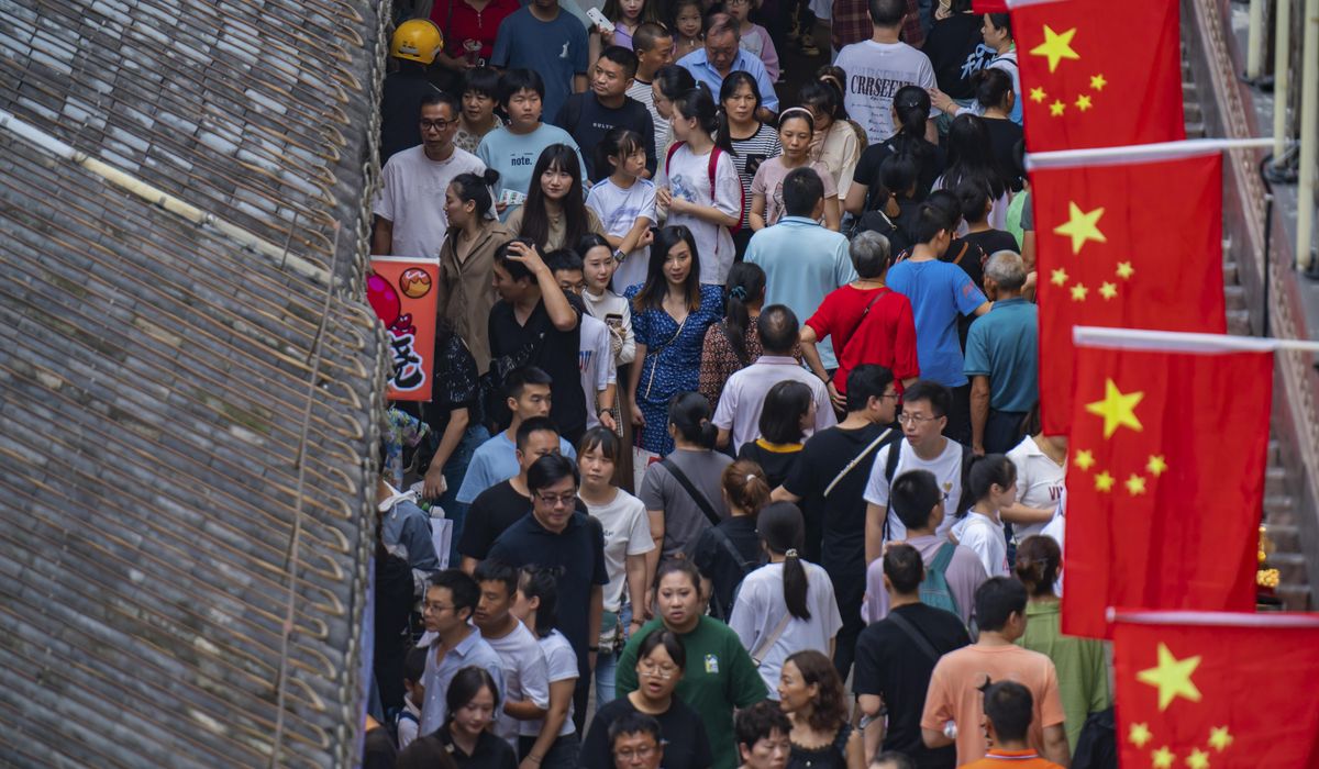 NextImg:China’s flagging economy gets a temporary boost as holiday travel returns to pre-pandemic levels