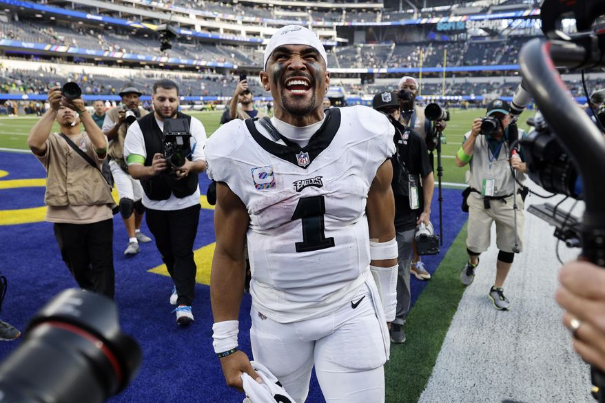 Philadelphia Eagles quarterback Jalen Hurts celebrates after the Eagles defeated the Los Angeles Rams 23-14 in an NFL football game Sunday, Oct. 8, 2023, in Inglewood, Calif. (AP Photo/Kevork Djansezian)