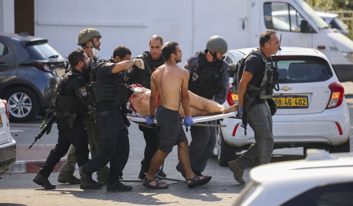 NextImg:Frantic attempts to escape or hide after Hamas attacked music festival