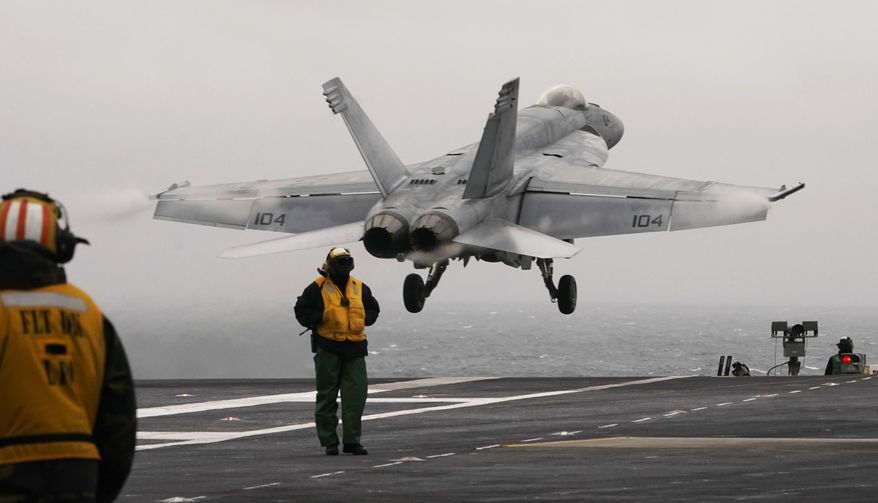 An F/A-18 E is launched from the deck of the aircraft carrier USS Gerald R. Ford during flight deck operations on Oct. 5, 2022, off the Virginia Coast. The Pentagon has ordered the Ford carrier strike group to sail to the Eastern Mediterranean to be ready to assist Israel, two U.S. officials said Sunday, Oct. 8, 2023. The USS Gerald R. Ford and its approximately 5,000 sailors and deck of warplanes will be accompanied by cruisers and destroyers in a show of force that is meant to be ready to respond to anything, from possibly interdicting additional weapons from reaching Hamas and conducting surveillance. (AP Photo/Steve Helber, File)