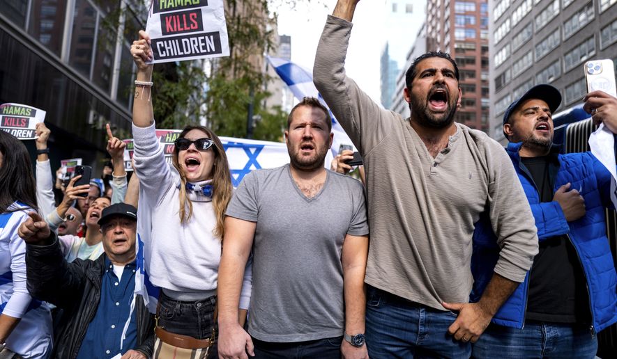 Supporters of Israel gather near the Israeli Consulate in New York, Monday, Oct. 9, 2023, in the wake of an attack on Israel by Hamas. (AP Photo/Craig Ruttle)