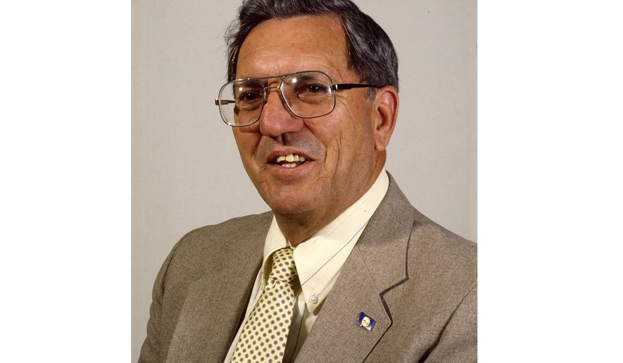 Former Montana Gov. Ted Schwinden poses in this May 23. 1985 photograph. The wheat farmer and Word War II veteran who gained national attention for keeping his home phone number listed during two terms in the governor’s office died Saturday, Oct. 7, 2023 at age 98. (The Billings Gazette via AP, file)