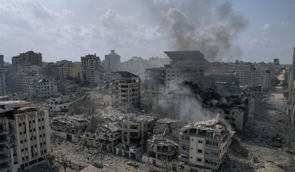 NextImg:Israel pounds downtown Gaza City, vowing punishing retaliation for weekend attack