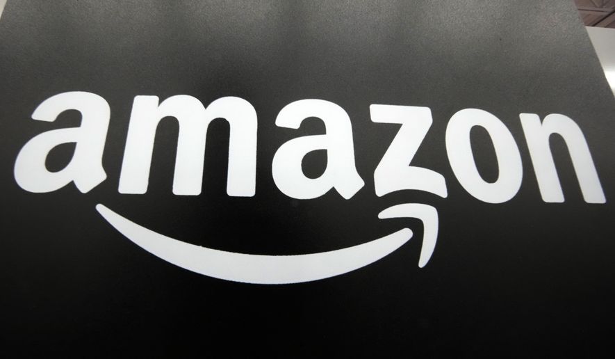 File - The Amazon logo is displayed at a Best Buy store in Pittsburgh on Jan. 23, 2023. The Federal Trade Commission's long-awaited antitrust case is the agency's most aggressive move yet to tame the market power of Amazon, a company that's become synonymous with online shopping and fast deliveries.(AP Photo/Gene J. Puskar, File)