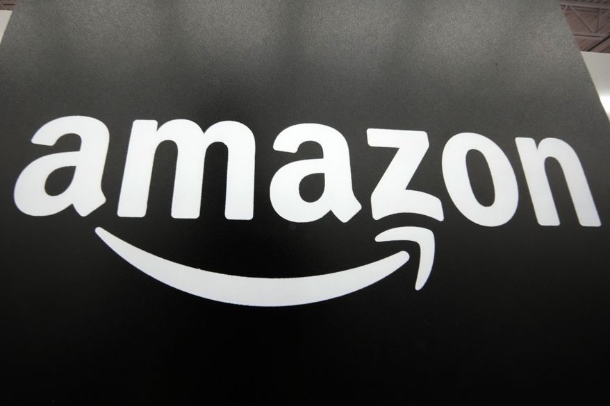 File - The Amazon logo is displayed at a Best Buy store in Pittsburgh on Jan. 23, 2023. The Federal Trade Commission's long-awaited antitrust case is the agency's most aggressive move yet to tame the market power of Amazon, a company that's become synonymous with online shopping and fast deliveries.(AP Photo/Gene J. Puskar, File)