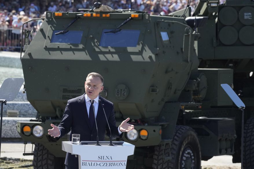 Poland's President Andrzej Duda speaks to open a massive military parade to celebrate the Polish Army Day in Warsaw, Poland, Tuesday, Aug. 15, 2023. (AP Photo/Czarek Sokolowski, File)