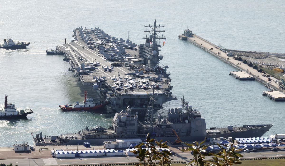 NextImg:U.S. aircraft carrier arrives in South Korea as Kim exchanges messages with Putin