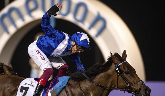 Lord North with jockey Frankie Dettori wins Group 1 Dubai Turf over 1800m (9 furlongs) at the Meydan racecourse in Dubai, United Arab Emirates, Saturday, March 25, 2023. The 52-year-old Italian jockey was set to retire at the end of 2023 but he has reversed his decision and will continue to ride horses primarily in the United States but also in the Middle East. (AP Photo/Martin Dokoupil, File)
