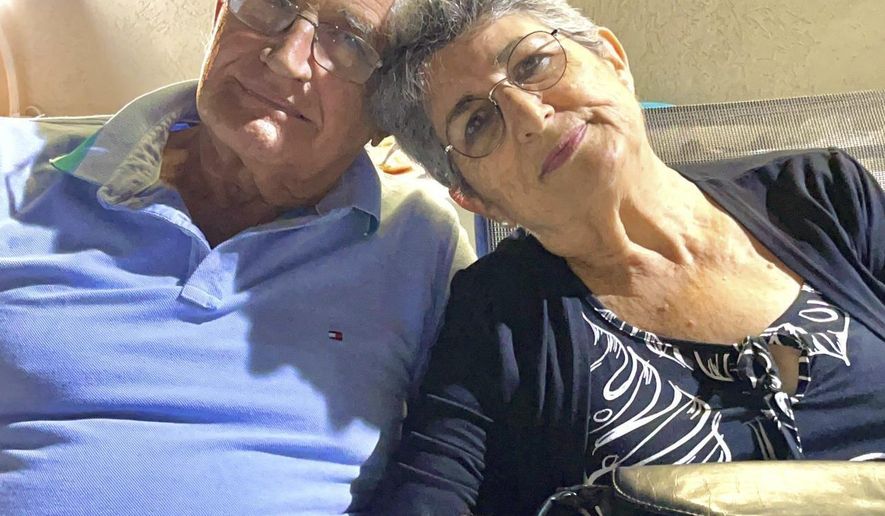 This handout photo provided by Anat Moshe Shoshany/Elinor Shahar Personal Management shows David Moshe and his wife Adina Moshe in an unknown location. (Anat Moshe Shoshany/Elinor Shahar Personal Management via AP)