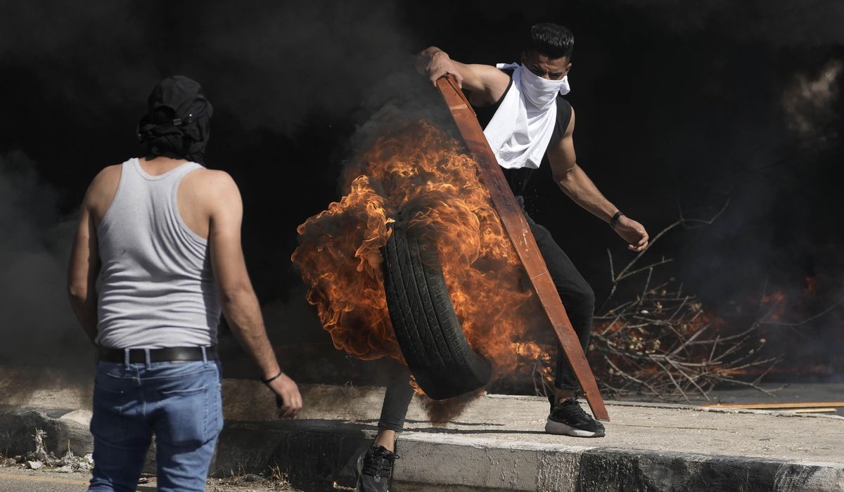 NextImg:While the world is watching Gaza, violence fuels growing tensions in the occupied West Bank